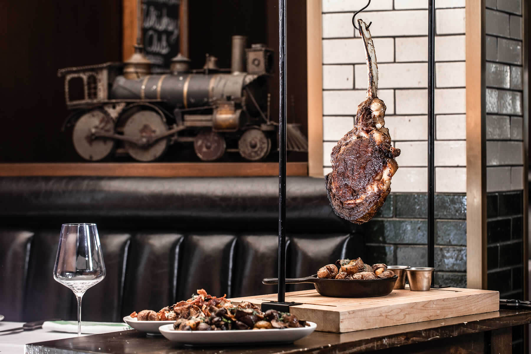 A dining room table set for service, standing in until Hanoi venue photography is supplied